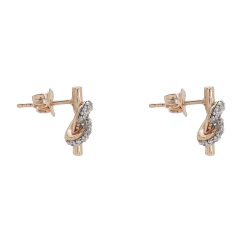 Aretes moño en plata con baño de oro rosa 18K con zirconia