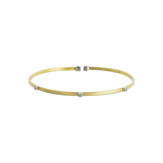 Brazalete en plata con baño de oro amarillo 14K con zirconia